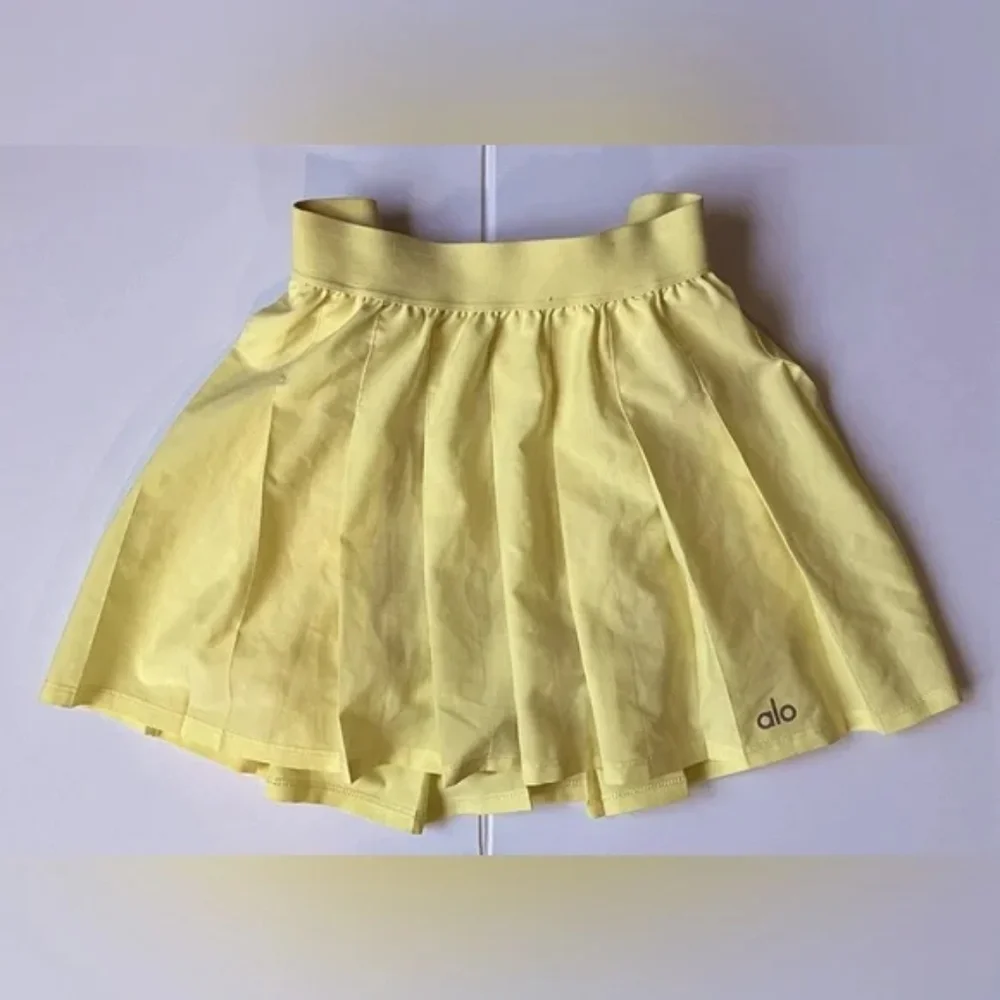 NWOT ALO YOGA Varsity Pleated Tennis Skirt Buttercup Yellow Size XXS